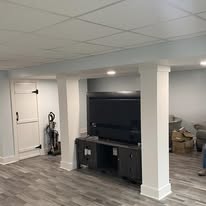 Finished basement with built-in TV stand