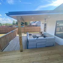 Covered deck with outdoor living space