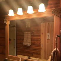 Rustic bathroom vanity lighting and mirror install